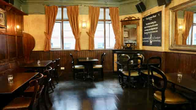 Cozy Function Room at The Queens Head, perfect for intimate meetings and private events.