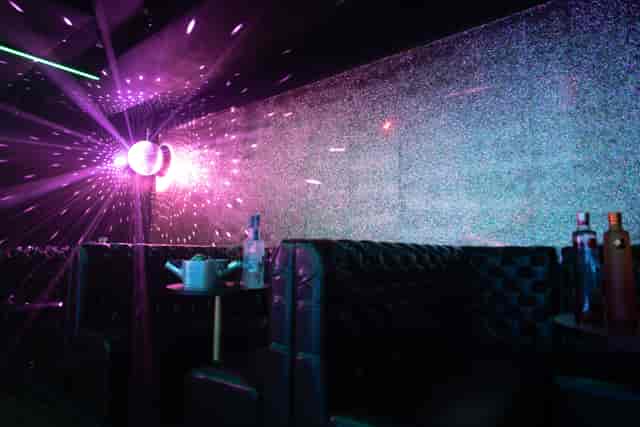 Vibrant event space in Aura Tunbridge Wells with dynamic lighting for upscale gatherings.