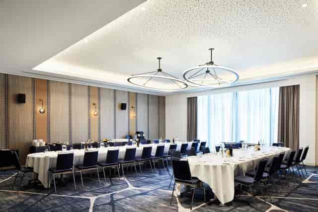 Hyatt Regency Manchester meeting room with U-shaped table for corporate events.