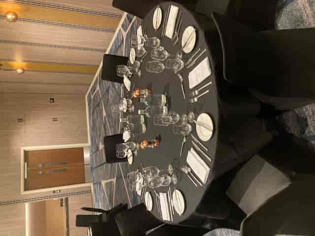Elegant round table setup in The Waterhouse Room, Hyatt Regency Manchester for upscale events.