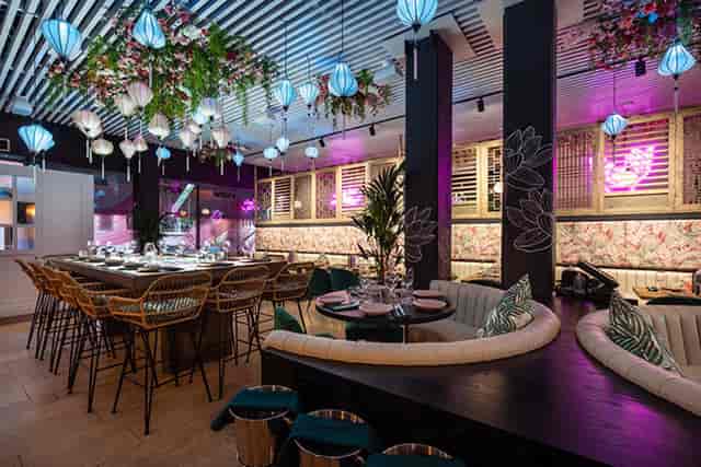 Vibrant Namii Kitchen & Cocktails event space with modern decor for gatherings and meetings.