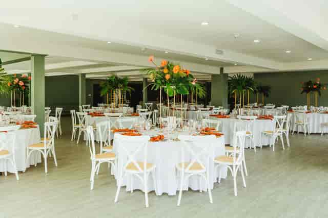 John Rylands Rooftop event space with elegant tables, ideal for weddings and corporate gatherings.