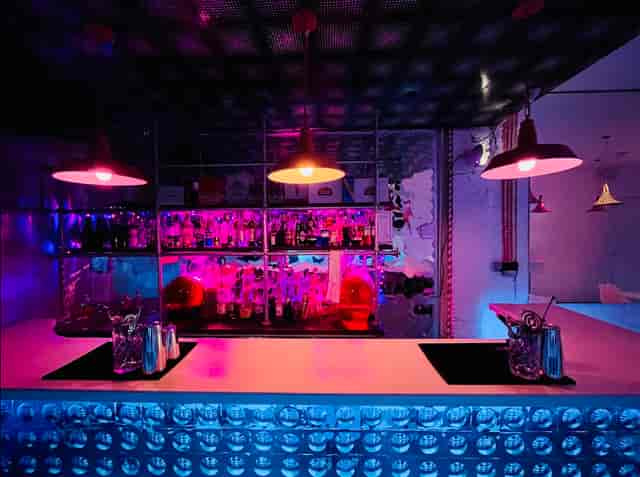 Vibrant Bonkers Bar with colorful lighting, ideal for cocktail receptions and networking events.