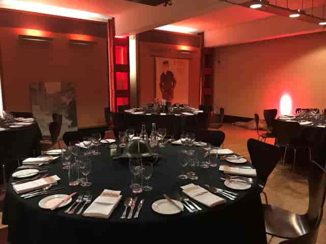 Elegant dining setup in HCA Auditorium, perfect for corporate events and formal gatherings.