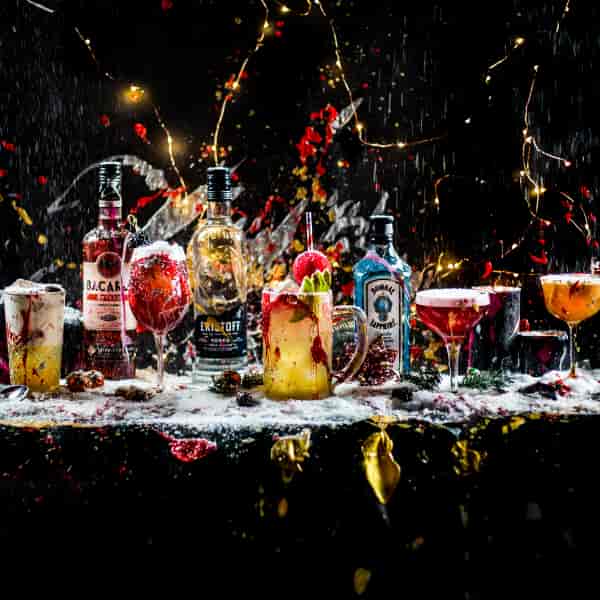 Vibrant cocktails in upscale venue for festive receptions and themed parties.