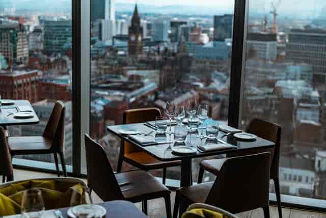 Grill Hire at 20 Stories Restaurant with elegant dining setup and cityscape view for corporate events.