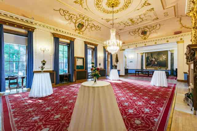 Elegant Court Room with adorned ceiling, ideal for upscale receptions and networking events.