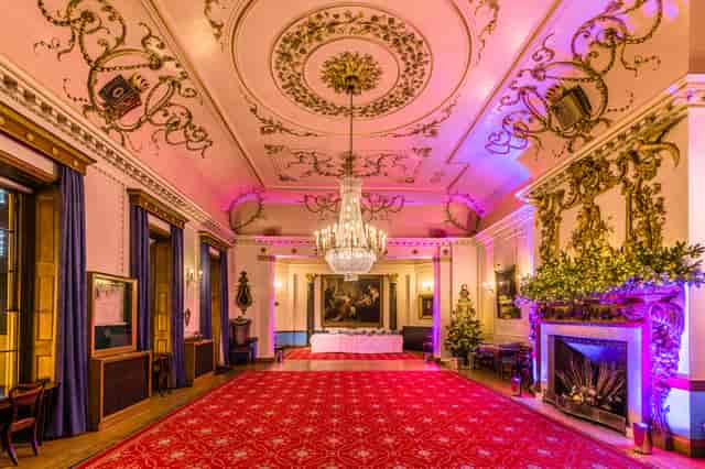 Elegant Court Room with ornate ceilings, ideal for holiday parties and formal receptions.