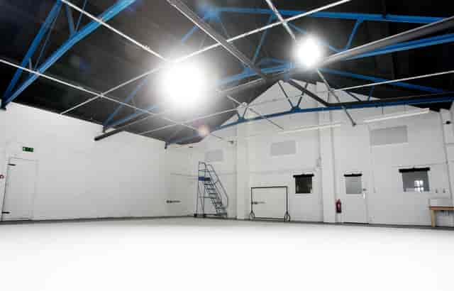 Spacious event space in Klatch Studio with high ceilings for meetings and workshops.