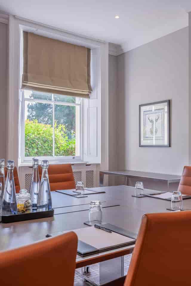 Surrey Room at Oatlands Park Hotel, modern meeting space with natural light for events.