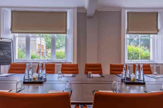 Surrey Room at Oatlands Park Hotel, bright meeting space for professional gatherings.