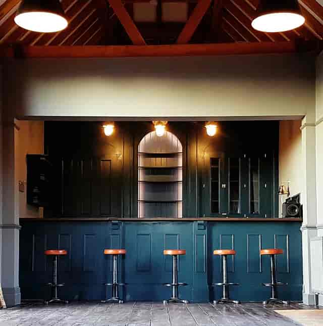 Stylish minimalist bar at Fair Oak Farm for intimate gatherings and networking events.