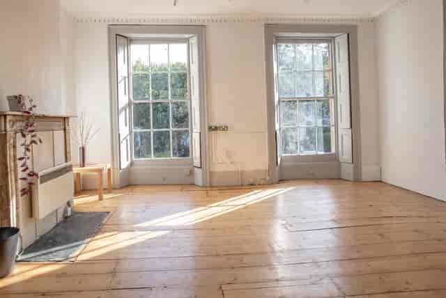 Bright, airy event space with large windows, ideal for meetings and workshops.