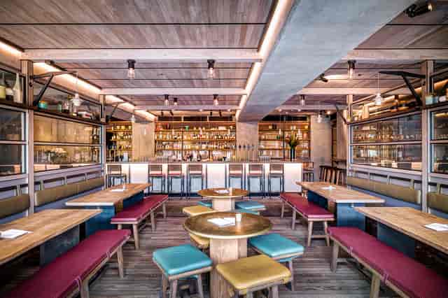 Canalside Bar at The Lighterman, modern venue for networking events and receptions.