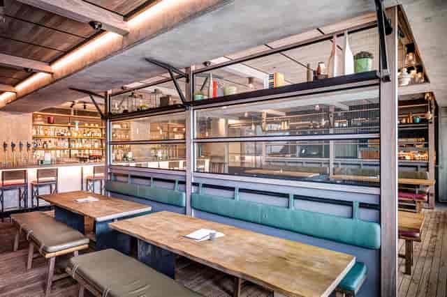 Canalside Bar & Terrace: Modern venue with natural light for corporate and social events.