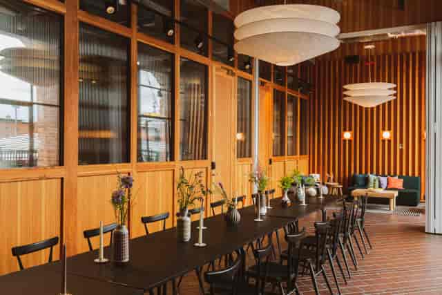 Stylish meeting space with elegant table, ideal for events and gatherings at Ducie Street Warehouse.