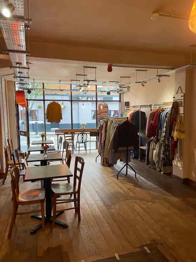 Cozy retail-dining space with stylish displays for pop-up events and workshops.