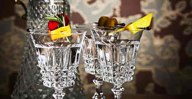 Elegant cocktails in crystal glassware for upscale networking events and celebrations.