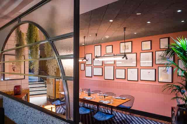Stylish dining space at Studio 54, ideal for intimate meetings and small events.