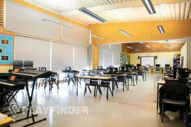 Versatile music room with natural light for workshops and meetings at St Aloysius' College.