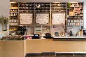 Main floor of 2Beans café with organized counter, perfect for networking events.