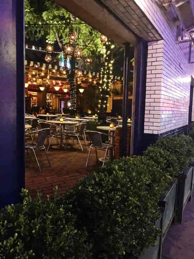 Outdoor dining space at B Bar and Grill, perfect for casual networking events and receptions.