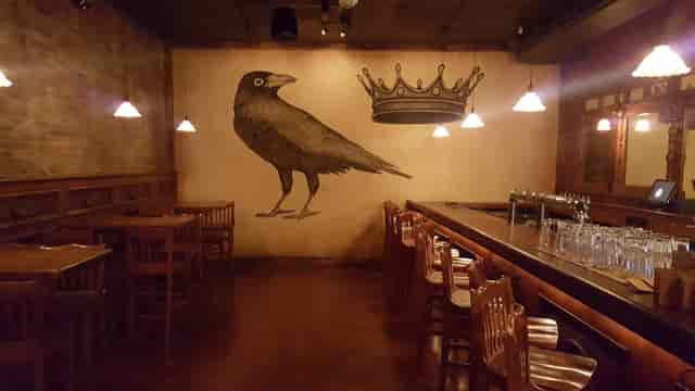 Artistic Crow Bar with mural, ideal for intimate gatherings and creative events.