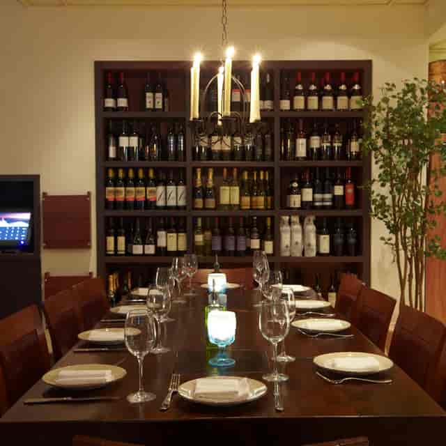 Intimate Chef's Table at Kellari Taverna, perfect for wine tastings and exclusive dinners.