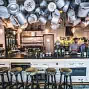 Stylish bar area in Ibérica Victoria, ideal for networking events and cocktail receptions.