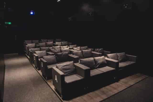 Intimate seating in Mockingbird Cinema for presentations and small group events.