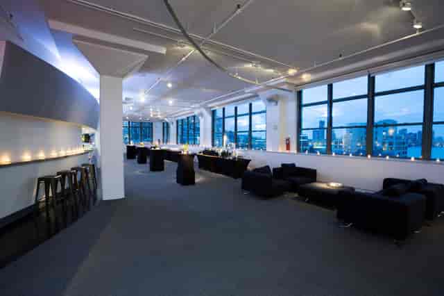 Sleek Tribeca 360 event space with expansive windows, perfect for upscale gatherings.