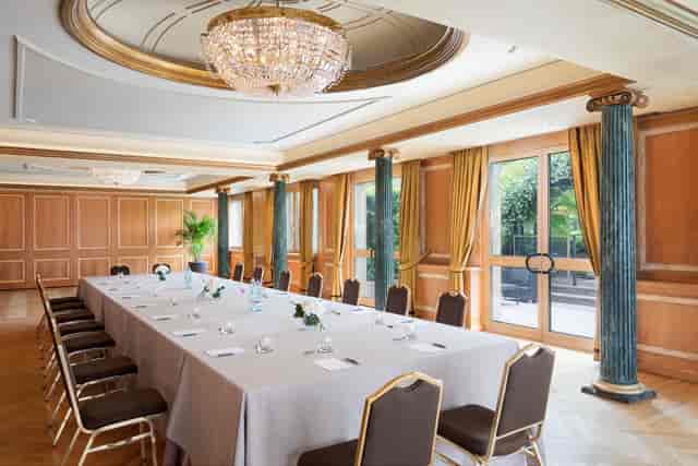 Verdi Room at The Westin Palace, Milan: elegant meeting space with natural light.