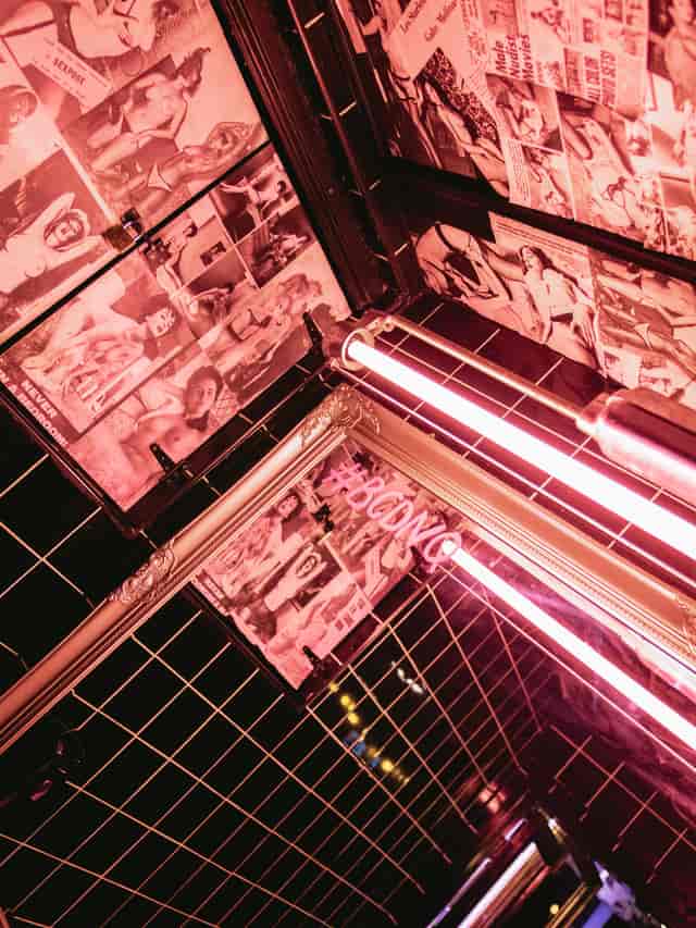 Mayfair Suite venue with neon lights, ideal for creative events and networking.