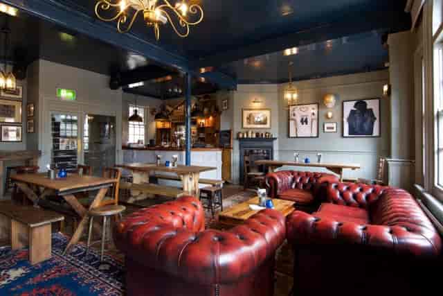 Cozy Blue Room at St Aldates Tavern, ideal for intimate meetings and networking events.