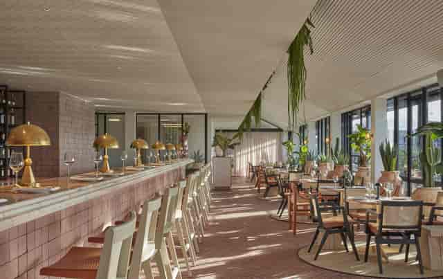 Rooftop Bar at One Hundred Shoreditch Hotel, modern venue for events and gatherings.