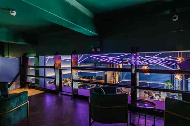 Modern event space The Mezzanine in Camden with vibrant lighting for meetings and gatherings.