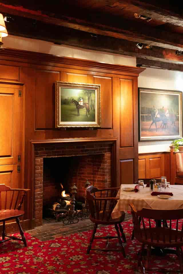 Cozy dining space with wooden paneling at Clyde's of Georgetown for upscale events.