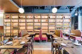 Modern DBGB restaurant in DC, featuring warm lighting for intimate gatherings and meetings.