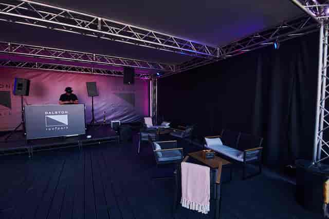 Dalston Roofpark rooftop event space with DJ booth, ideal for gatherings and networking.