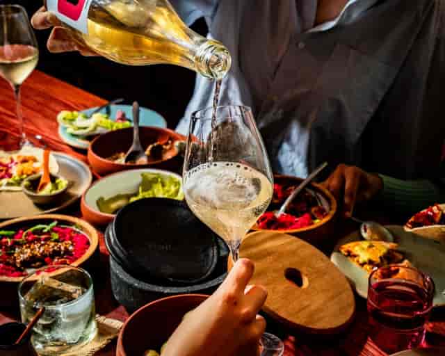 Vibrant dining setup in Sala Rosa Room, perfect for gatherings and celebrations.