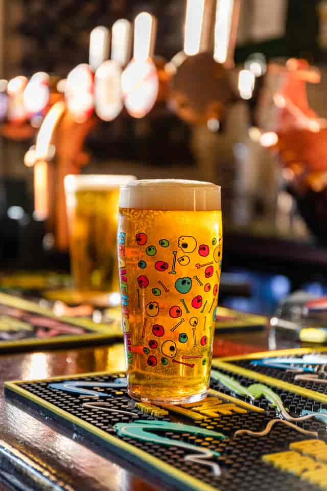 Vibrant pint of beer in Inn on the Square's function room for social events.