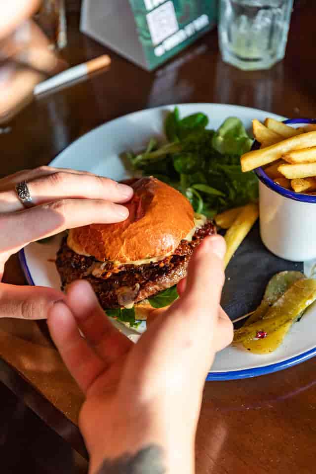 Gourmet burger close-up in Inn on the Square's function room for events and catering.