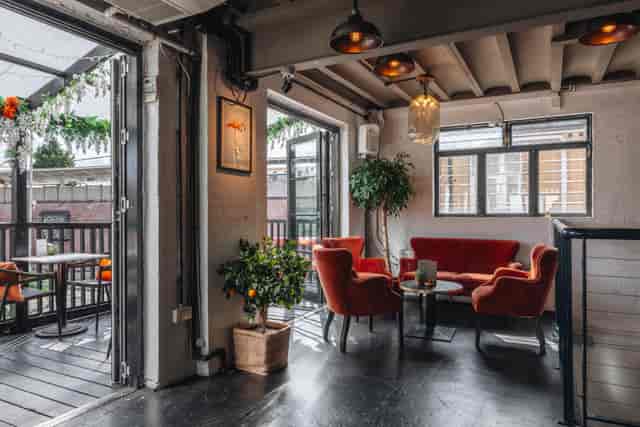 The Exhibit Balham VIP lounge: industrial breakout space for networking and corporate events.
