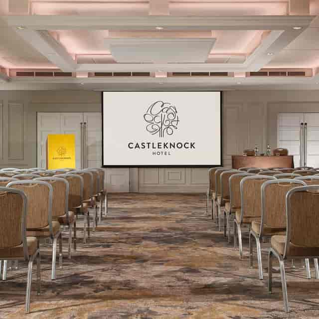 Castleknock Suite conference room with large screen, ideal for meetings and events.