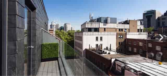 Modern rooftop terrace at Charing Cross apartment, perfect for outdoor events and networking.
