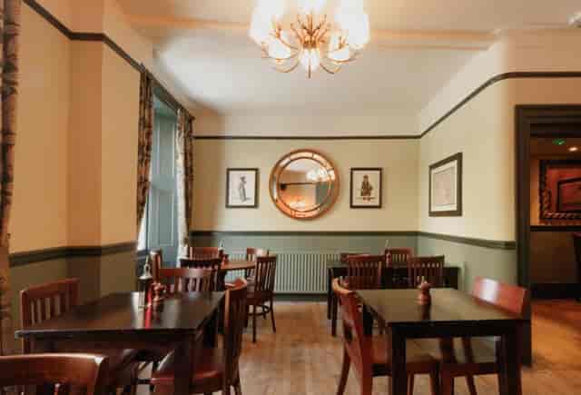 Christmas dining at The Perseverance Marylebone: cozy, high-ceilinged room for private events.