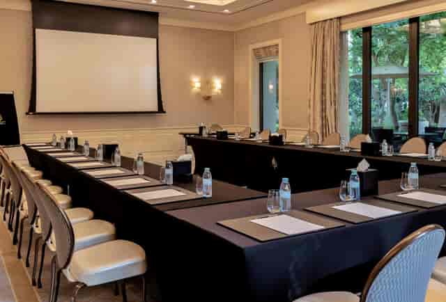 Jawharah Room at Four Seasons Dubai, elegant meeting space with natural light and setup.