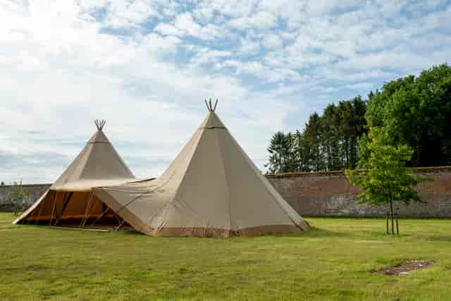 Walled Garden Raynham with tipis, perfect for weddings and outdoor events.