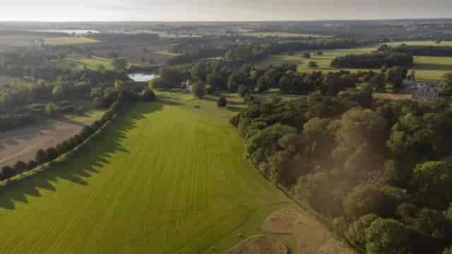 Raynham Park landscape with green fields, ideal for outdoor events and weddings.