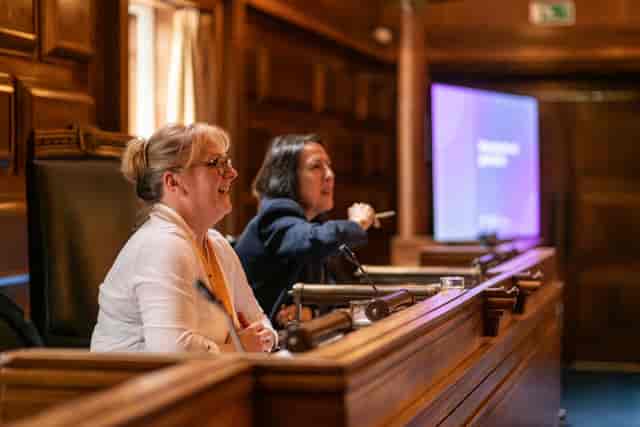 London Senate conference room panel discussion executive briefing